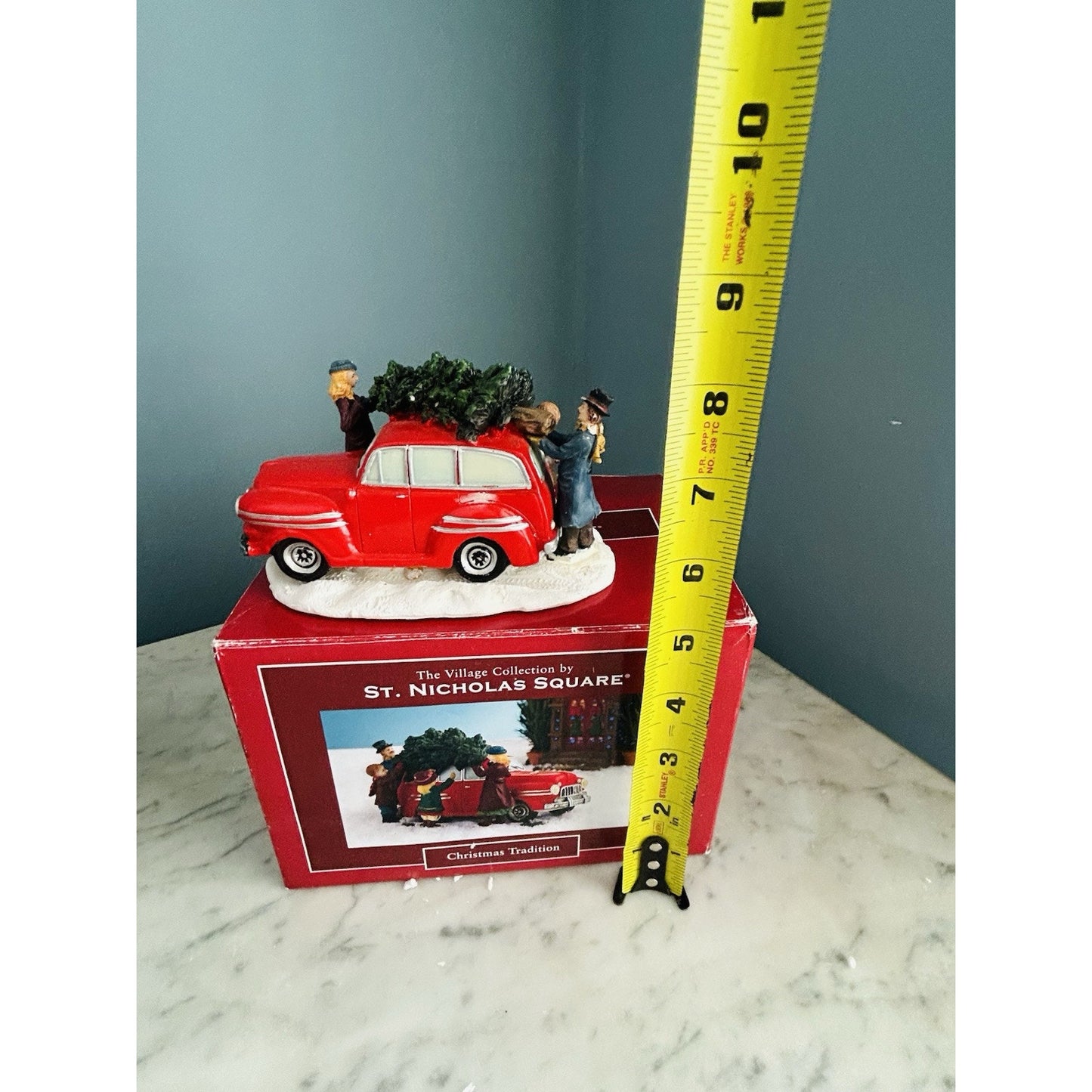 The Village Collection St. Nicholas Square Christmas Tradition Red Car Tree Top