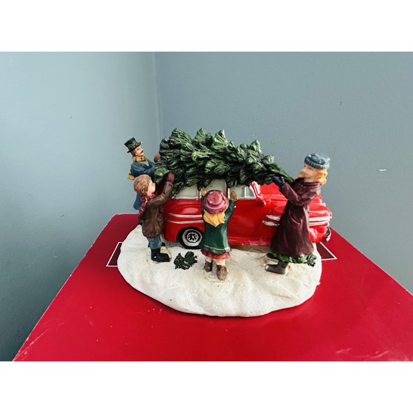 The Village Collection St. Nicholas Square Christmas Tradition Red Car Tree Top