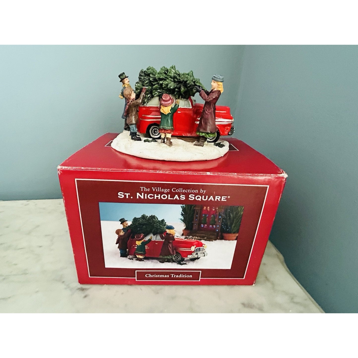 The Village Collection St. Nicholas Square Christmas Tradition Red Car Tree Top