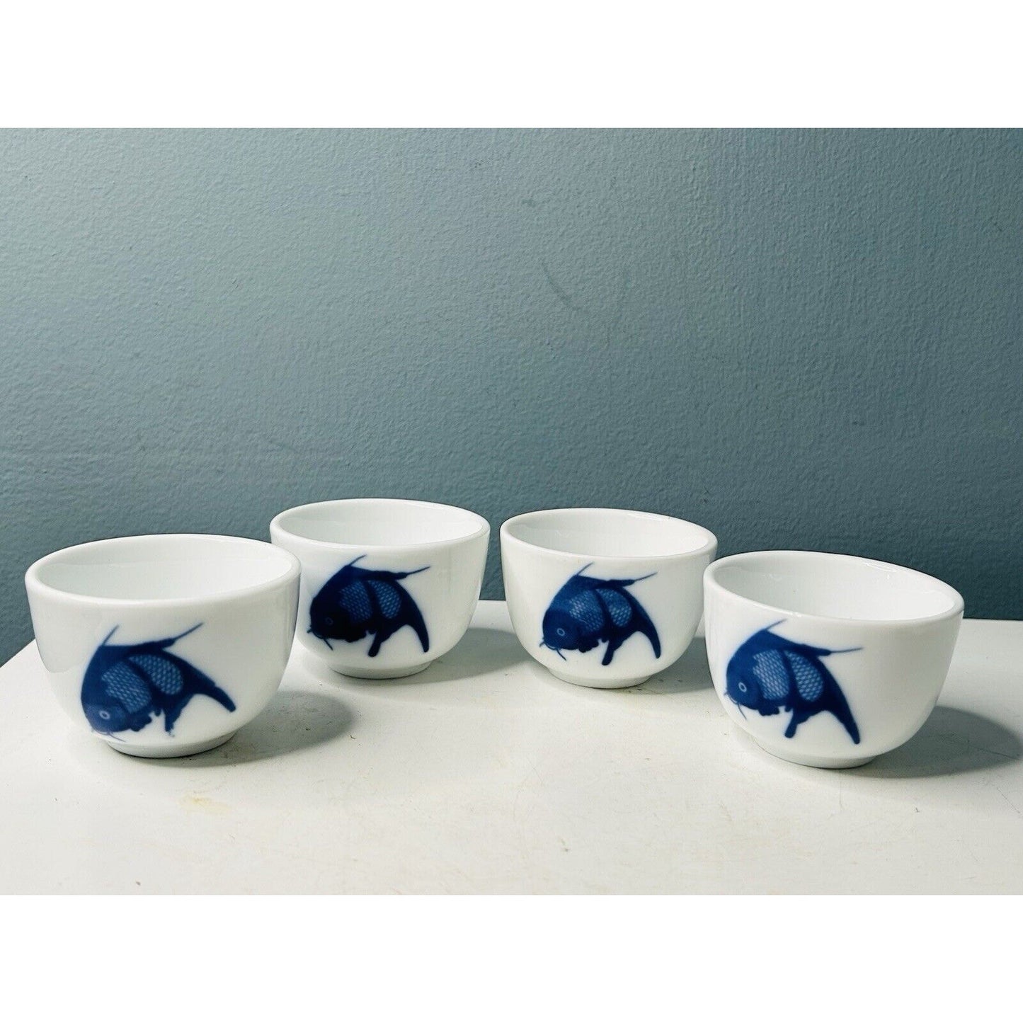 4 Misty Rose Blue Koi Cups Super White China Fish Sake Tea Condiment Bowls EUC